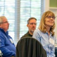 Alumni listening to the speaker.